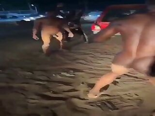 Naked african men fighting in front of a crowd - ThisVid.com