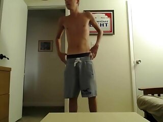 Twink has strong orgasm standing in his room