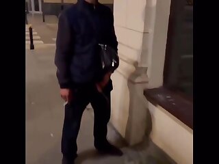 Handsome guy caught pissing on the street in public
