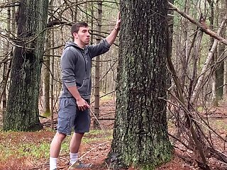 Pissing in the forest with cut dick and balls out