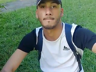Playing with his dick in a public park