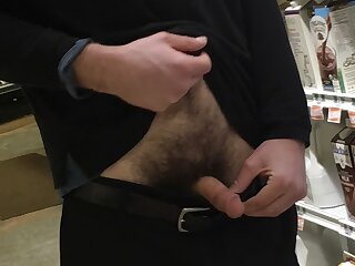 Sexy hairy supermarket employee, flashes his soft cut cock on the dairy isle on the job. I do not claim any ownership of this clip.