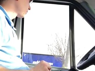 Sitting in his car