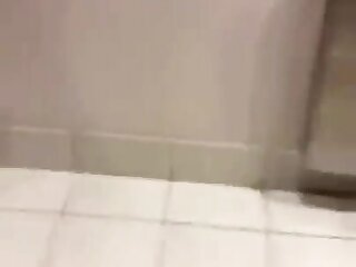 Boss sucking off employee in hotel restroom