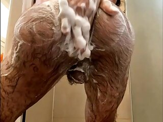 Beautiful young twink with hairy body in the shower wanks wanking jerks off dick cock