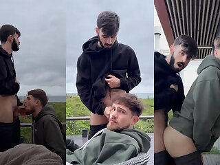 Gorgeous guys enjoy a beautiful airbnb view