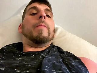 He flashes his bushy hard dick in his red shorts