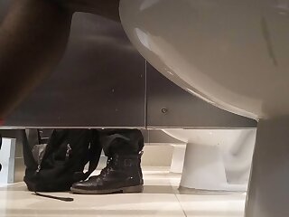 Another guy sat on the toilet to make a poop