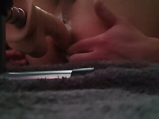 My fuck machine pounds my ass and makes it creamy.