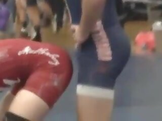 Wrestlers bulge touches opponents ass in hot accident.