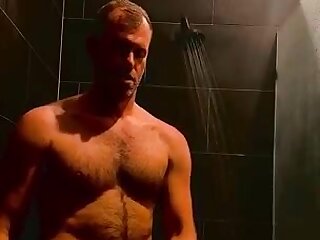 Hairy dilf cums in the shower