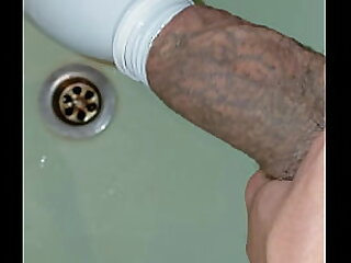 Awesome vacuum suction with a bottle of a tattooed&comma; sloppy cuck&period; Sucking a big dick and balls