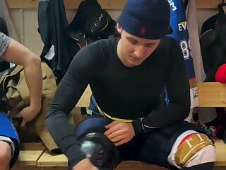 Watch a cute jock get into Hockey gear.