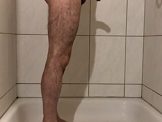 Hairy man takes a shower