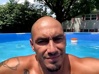 Naked tatted white guy in the pool flashes his ass hole
