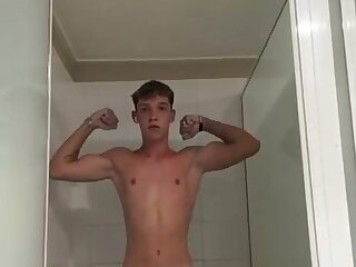 Guy scared to get caught in the communal showers so he’s being quick, look at that sexy tattoo