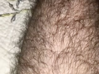 Hairy boy showing off his legs