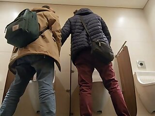 Turkish guys cruising in the urinals of a mall's bathroom