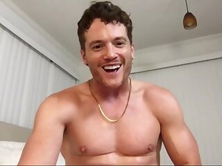 He jerks off in bed while showing off his ass and fingering it over and over again