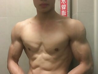 Asian muscle stud poses naked