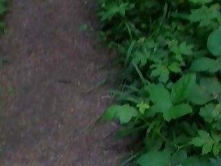 Dude walking in the woods with his small uncut dick ... out of his pants