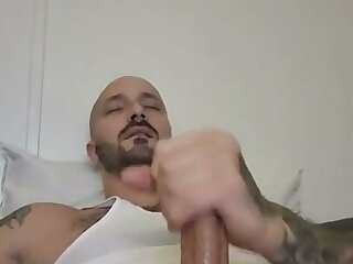 White rough trade guy in wifebeater jerking off solo
