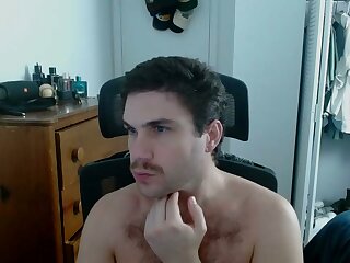 He jerks off his bushy cock in his room