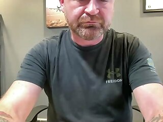 He jerks off his bulge through his pants and then flashes his nice ass standing up