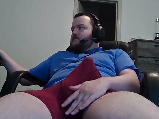 He jerks off his bulge though his boxer briefs until taking it off and jerks off his hard dick
