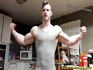 Huge Biceps ripping a shirt and flexing hard