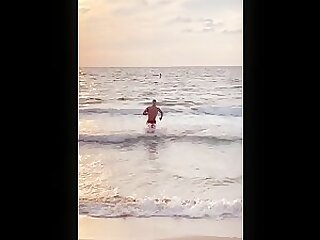 Bodybuilder Logan Foote emerging from the ocean 🌊