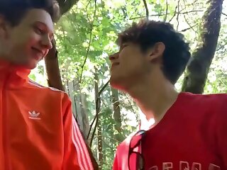 Two young Soccer Player fooling around and sucking each other in the woods